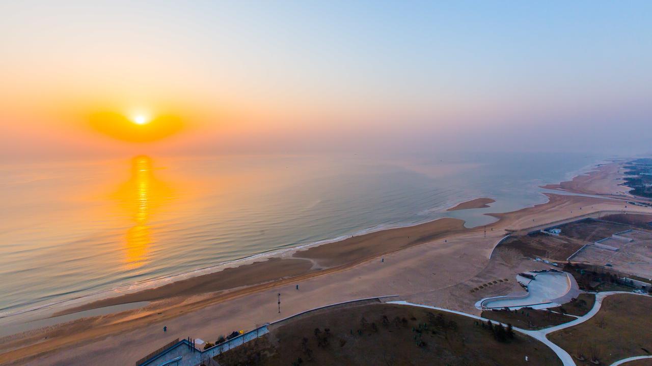 Qingdao Mangrove Tree Resort World - Red Coral Hotel Jiaonan Esterno foto